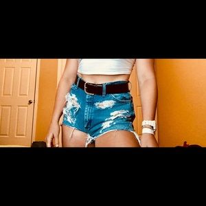 Distressed Wrangler cut off shorts